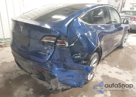 2022 Tesla Model Y Long Range Dual Motor All-Wheel Drive z USA, uszkodzony, nr VIN 7SAYGDEE1NF313449